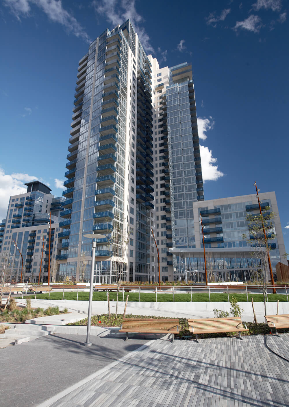 external view of a tall glass building against the sky